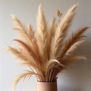 A modern arrangement of dried pampas grass and flowers.